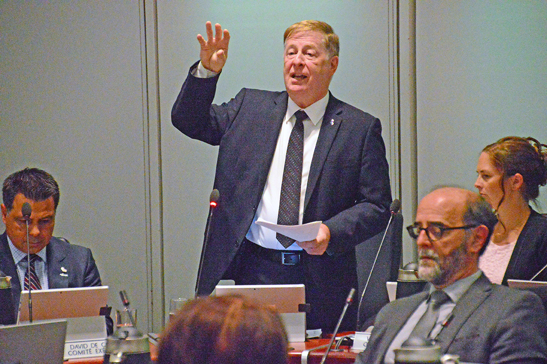 Mayor Marc Demers answers questions during the Aug. 8 Laval city council meeting.
