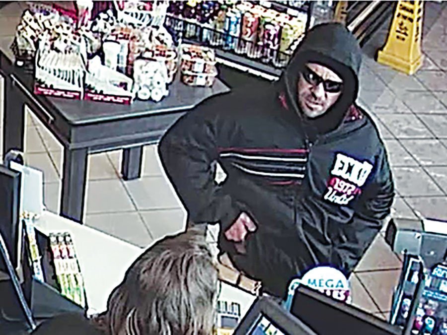 Laval police are searching for a suspect who held up a service station in March.
